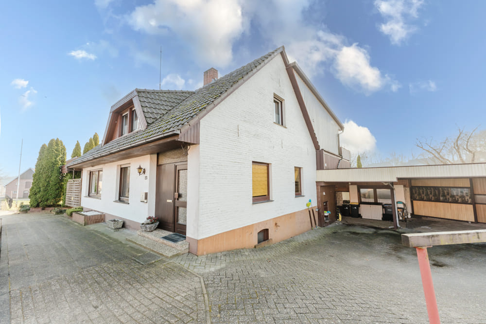 Immobilie in Uelsen - Einfamilienhaus mit viel Platz - Nebengebäude und Weitblick - Bild 0
