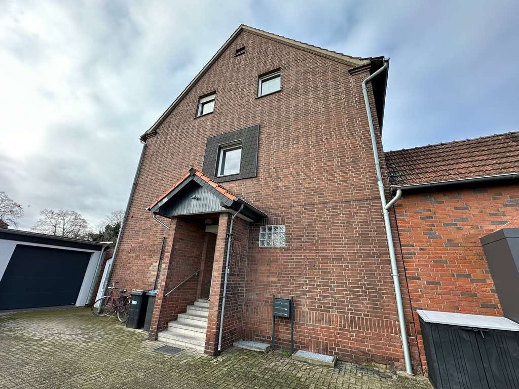 Immobilie in Schermbeck - Vermietetes Mehrfamilienhaus mit separaten Gärten sowie zwei Garagen in Sackgassenlage! - Bild 1