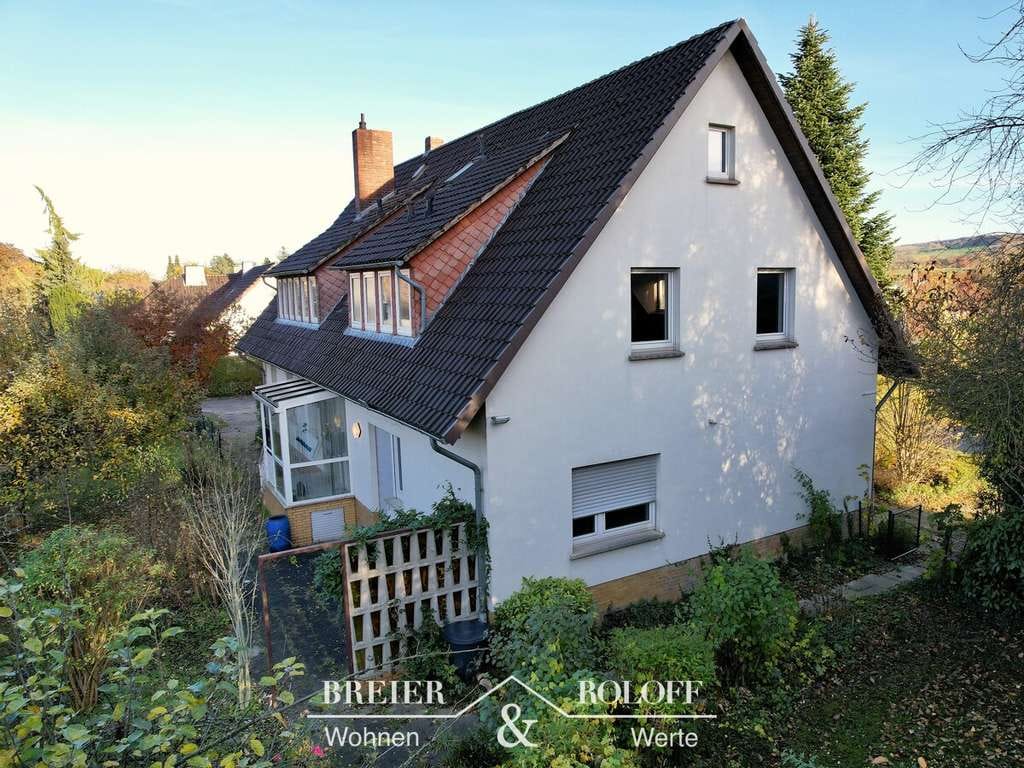 Immobilie in Rinteln - Zweifamilienhaus mit Doppelgarage und Ausbaureserve in Rinteln-Krankenhagen - Bild 1