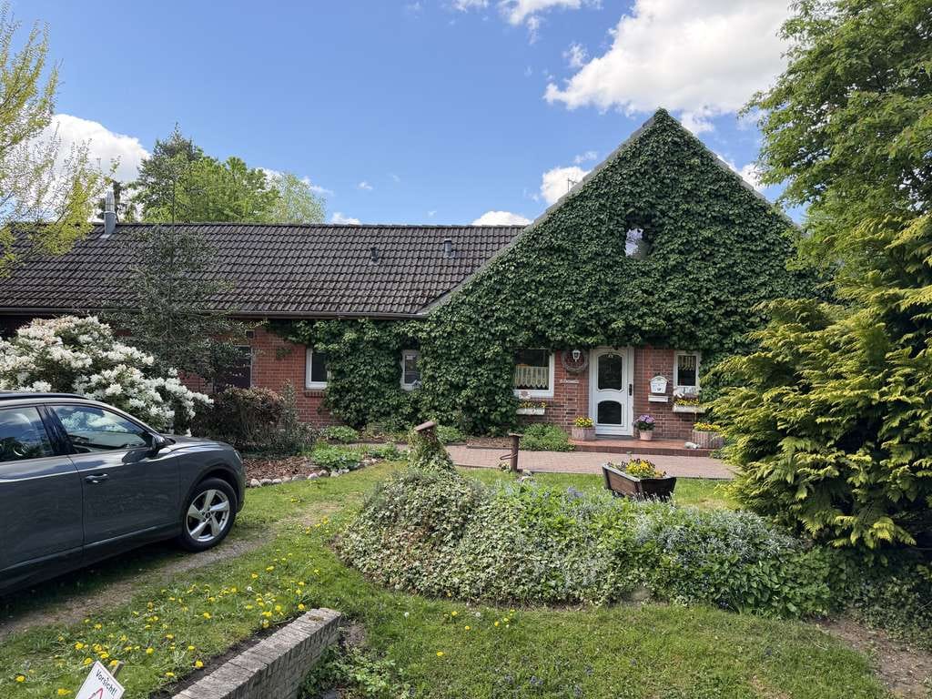 Immobilie in Schiffdorf - Familienhaus gesucht? Gefunden! Hübsches Rotsteinhaus mit parkähnlichem Grundstück in Schiffdorf-Weh - Bild 0