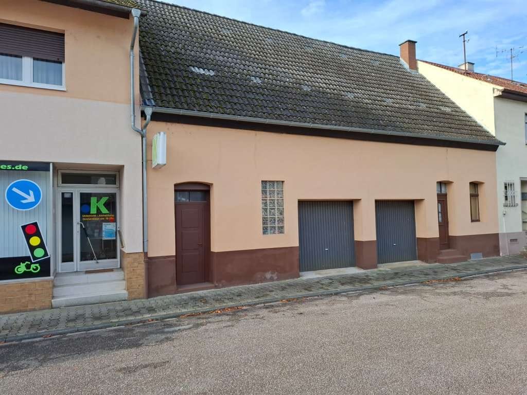 Immobilie in Philippsburg - 1-2 Familienhaus mit gutem Raumangebot und großen Garagentrakt der ideal für Hobbyhandwerker ist - Bild 4