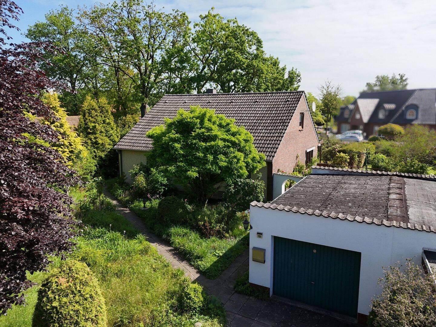 Immobilie in Schwarme - Toll für Paare oder kleine Familien: Einfacher, ebenerdiger Bungalow mit naturnahem Garten - Bild 1
