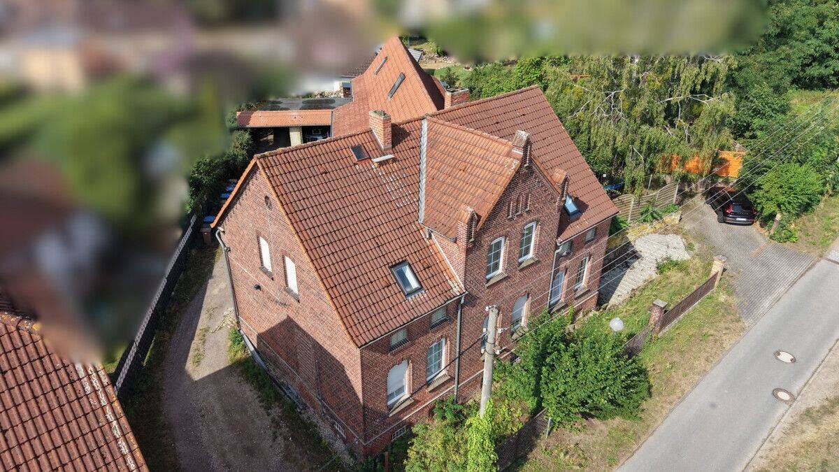 Immobilie in Raguhn-Jeßnitz - Kapitalanlage in Raguhn - drei vermietete Wohnungen mit Außenflächen - Bild 0
