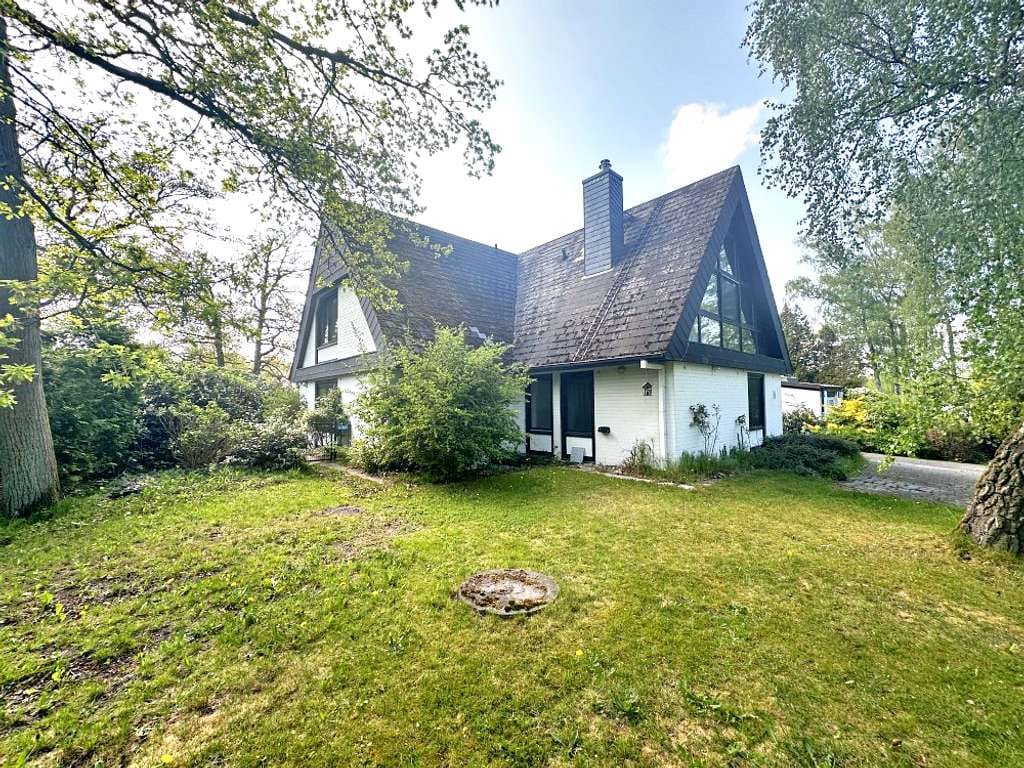 Immobilie in Ammersbek - Stilvolles Architektenhaus in idyllischer Wohnlage mit großem Garten - Bild 1