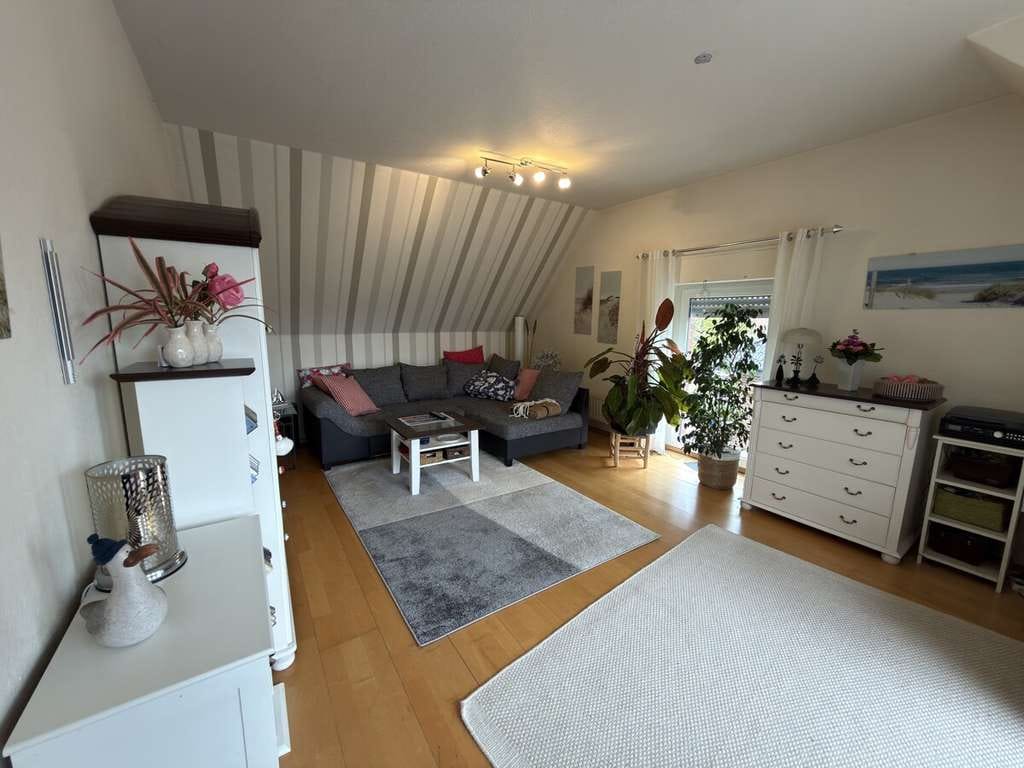Immobilie in Ostbevern - Gemütliche Dachgeschosswohnung mit Balkon und Terrasse - Bild 0