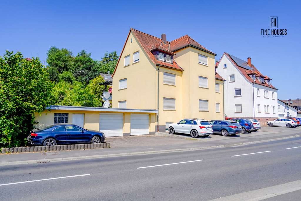 Immobilie in Mömlingen - Solide Kapitalanlage mit drei genehmigten Wohneinheiten, Garagen und attraktiven Mieteinnahmen - Bild 1