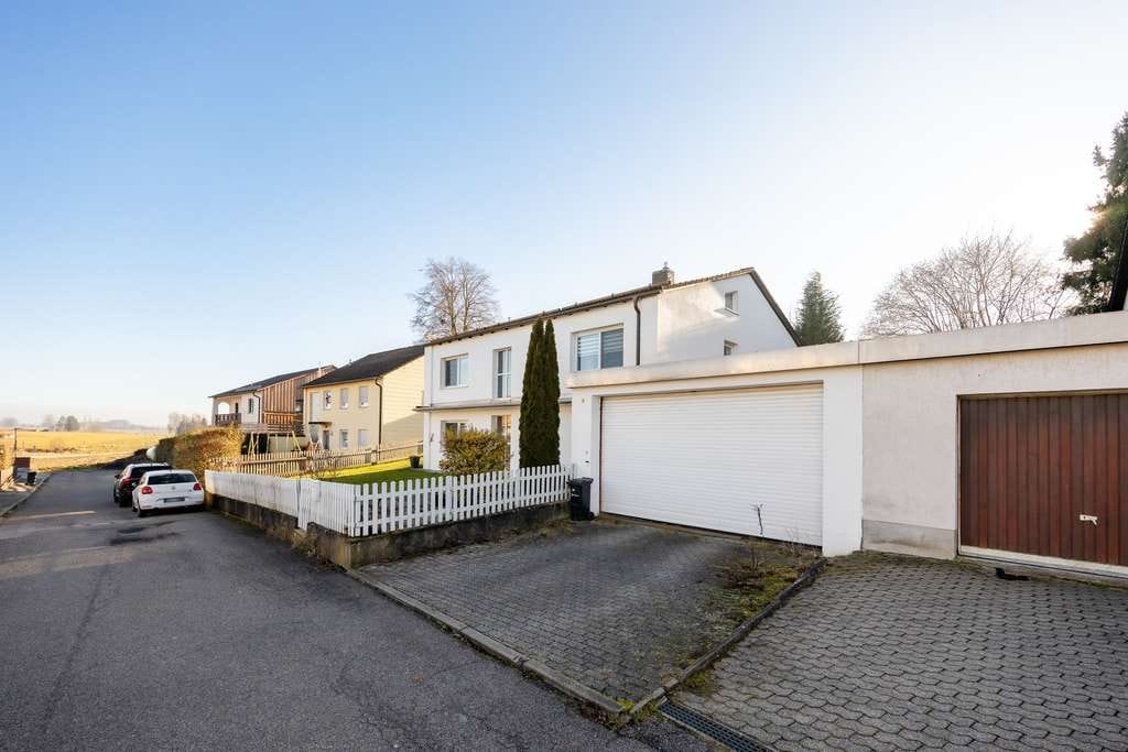 Immobilie in Velden - Vermietetes Einfamilienhaus mit Südgarten und guter Anbindung - Bild 1