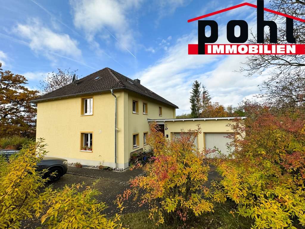 Immobilie in Bad Rodach - Voll vermietet und teilsaniert! Zweifamilienhaus mit ELW in Ortsrandlage! - Bild 0