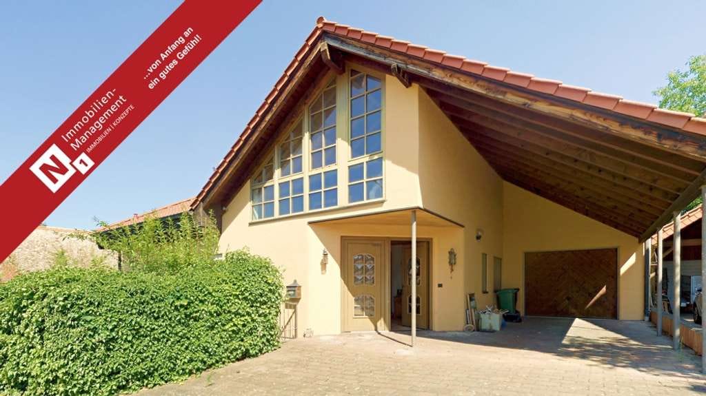 Immobilie in Einselthum - Architektonisch ansprechender Bungalow mit Wintergarten und Garage auf großzügigem Grundstück - Bild 0