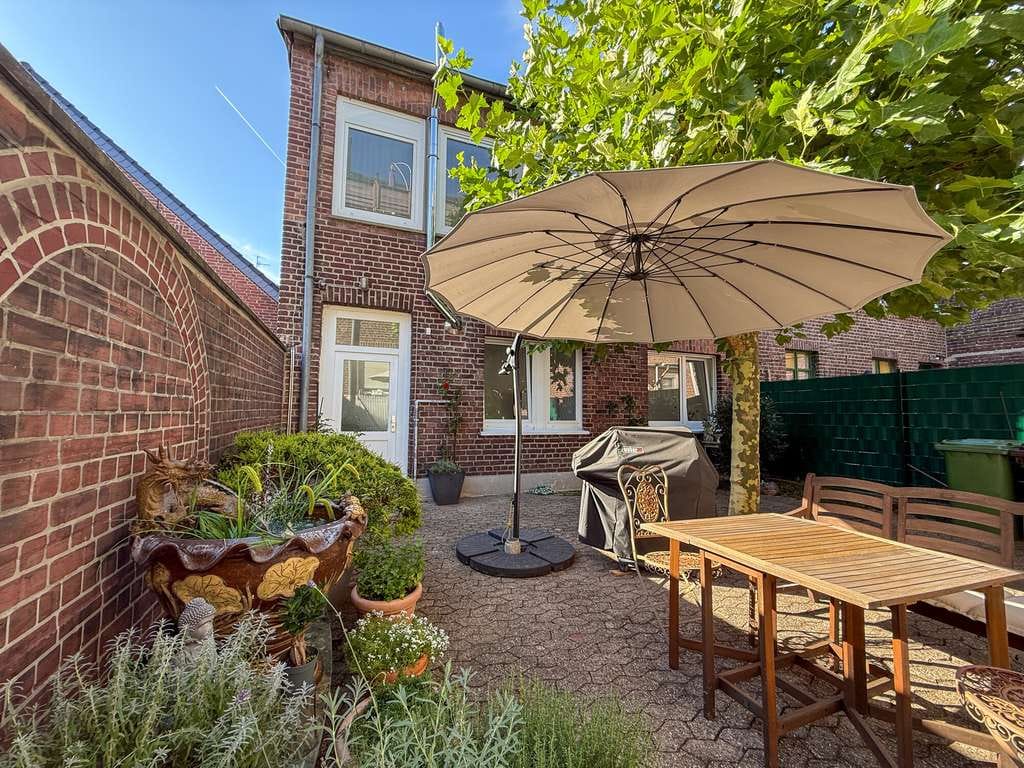 Immobilie in Tönisvorst - Grün wohnen im Zentrum: Wohnung mit Garten in St. Tönis - Bild 1