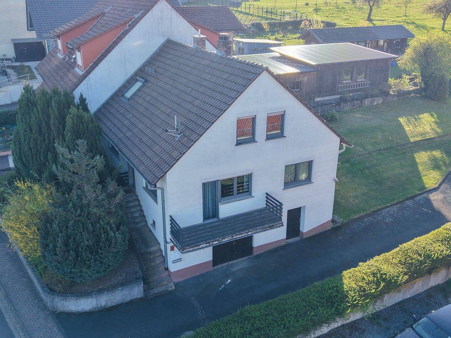 Immobilie in Bischbrunn - Grünes Wohnglück in Bischbrunn - EFH mit Einliegerwohnung und Garten - Bild 0