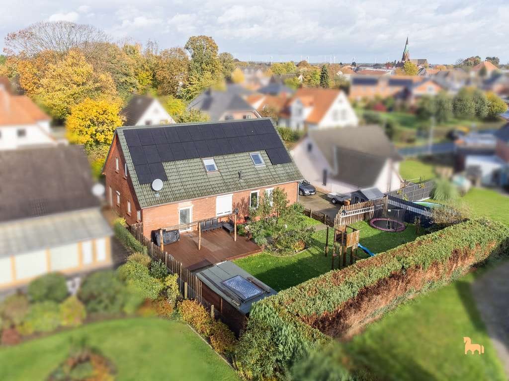 Immobilie in Twistringen - Familienfreundliches Traumhaus in bester Lage von Twistringen – energetisch saniert & provisionsfrei - Bild 1