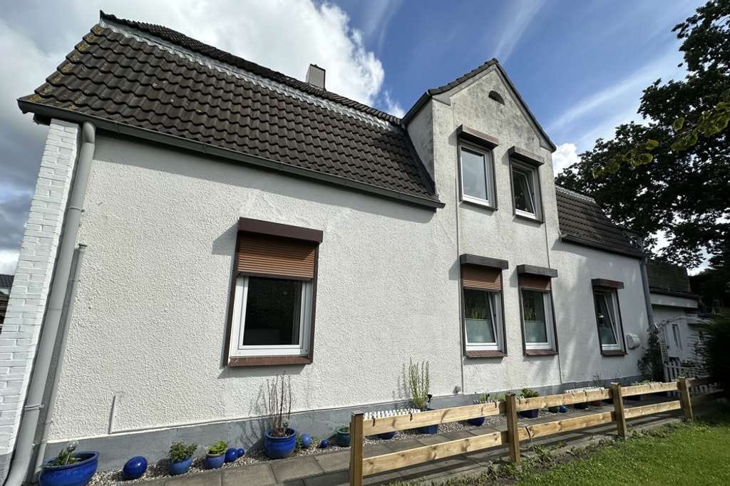 Immobilie in Leck - Solides Mehrfamilienhaus mit drei Wohneinheiten in ruhiger Lage in Leck - Bild 2