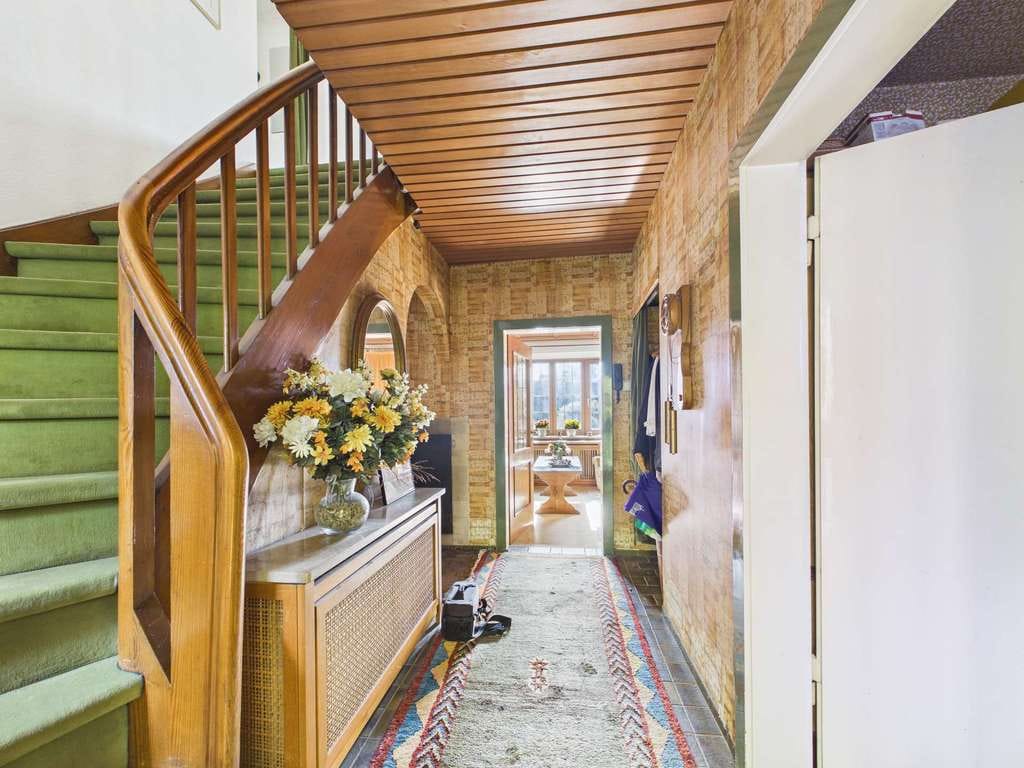 Immobilie in Grasbrunn - SITULI: Charmantes Einfamilienhaus mit Renovierungsbedarf und großem Garten - Bild 1