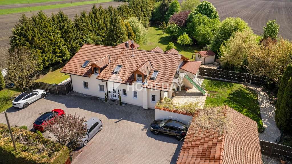 Immobilie in Finsing - Moderne DHH mit exklusiver Ausstattung, großzügigem Grundstück und nachhaltiger Energieversorgung - Bild 0