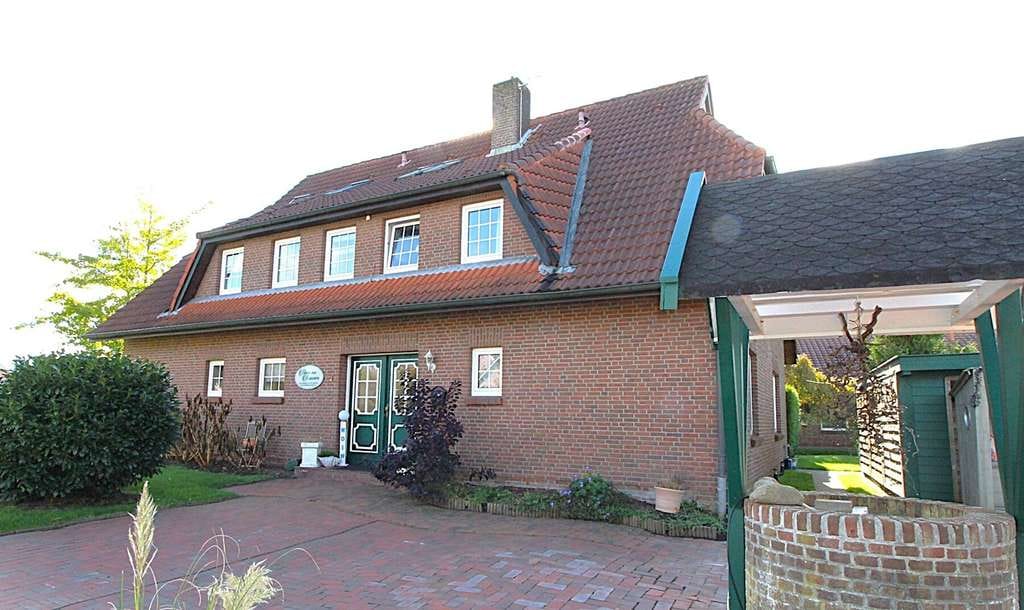 Immobilie in Werdum - Wohnhaus mit 4 schönen Wohnungen zu verkaufen, in dem wunderschönen Luftkurort Werdum! - Bild 1