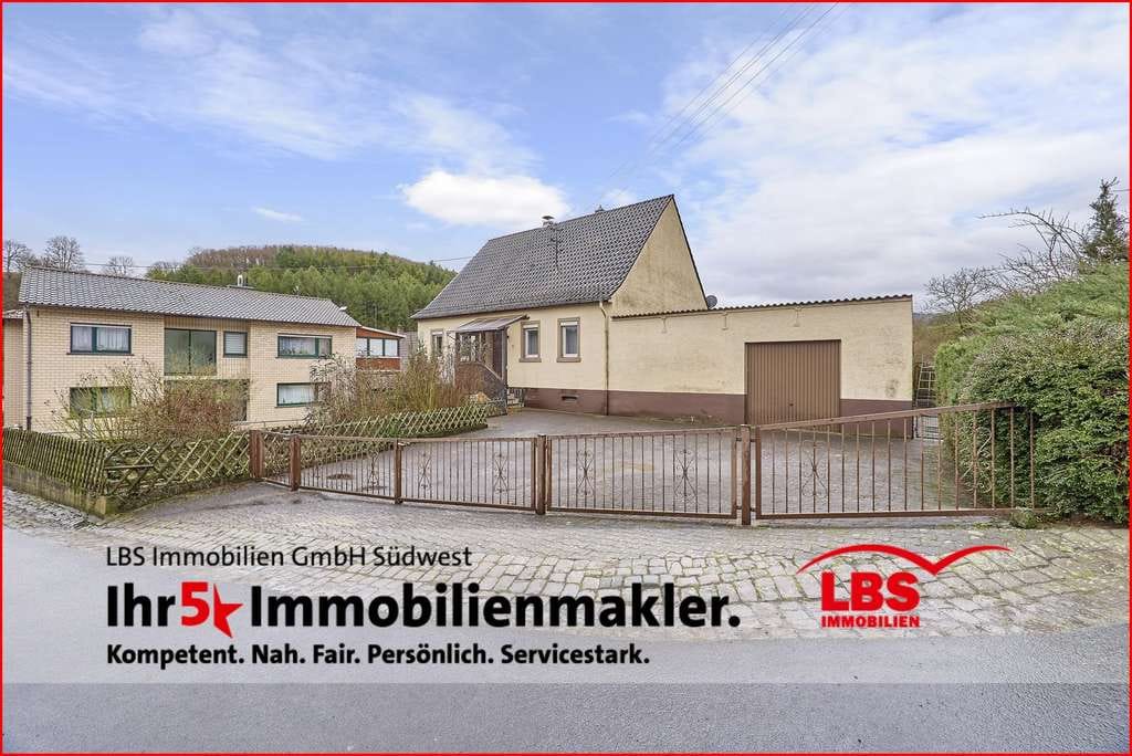 Immobilie in Mannweiler-Cölln - Freistehendes Wohnhaus mit Garage, Werkstatt und Ausbaureserve - Bild 1