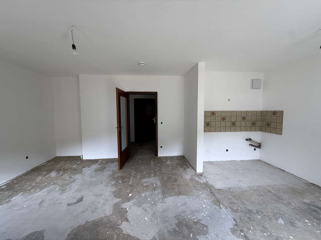 Immobilie in Bad Reichenhall - 1-Zimmer-Apartment mit Terrasse und Tiefgarage – viel Potenzial in sonniger Lage Bad Reichenhalls - Bild 2