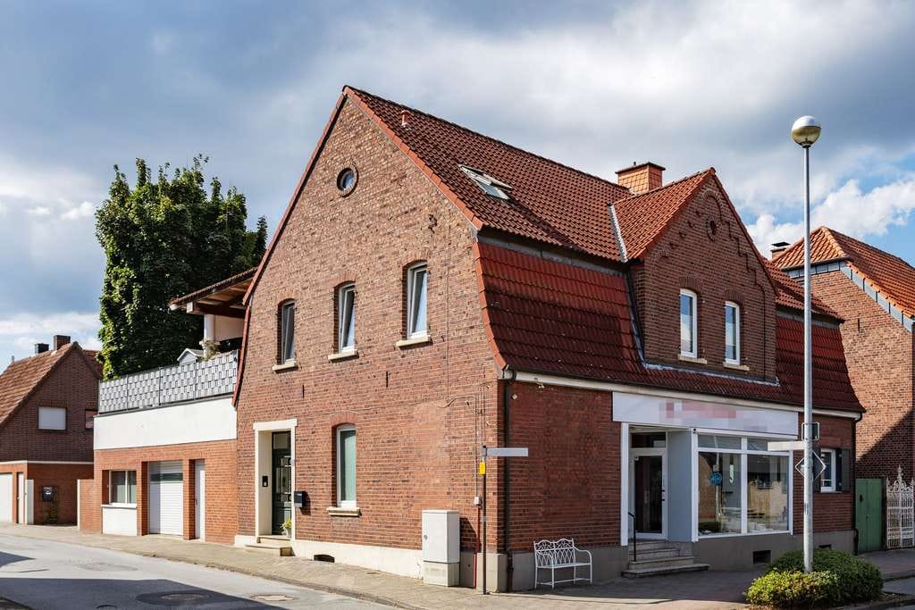 Immobilie in Greven - Vielseitiges Wohn- und Geschäftshaus mit sonnigem Lebensgefühl - Bild 1