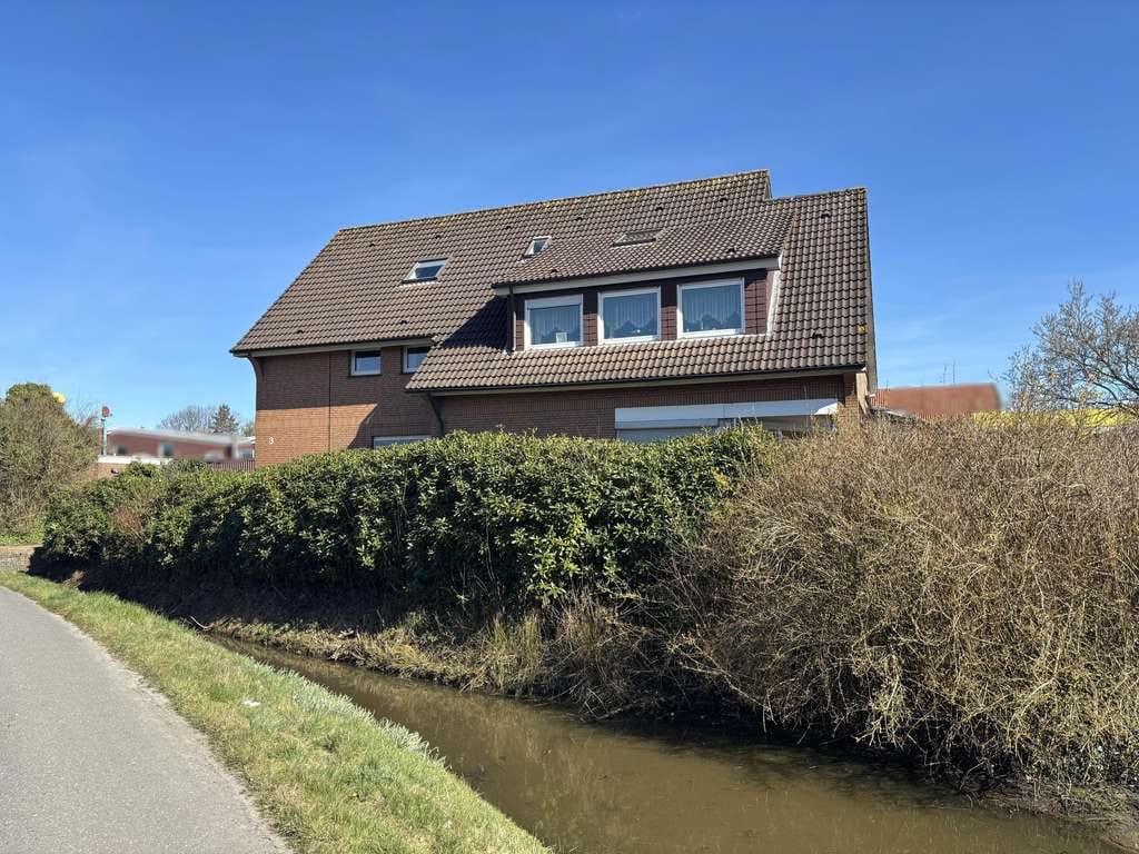 Immobilie in Esens - Zweifamilienhaus mit vielseitigen Nutzungsmöglichkeiten - Bild 4