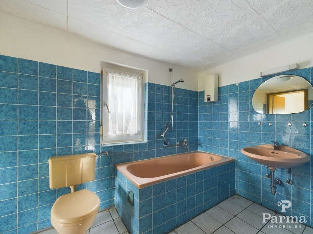 Immobilie in Hürtgenwald - Sanierungsbedürftiges Einfamilienhaus mit Baugrundstück und Doppelgarage in Hürtgenwald-Bergstein - Bild 3