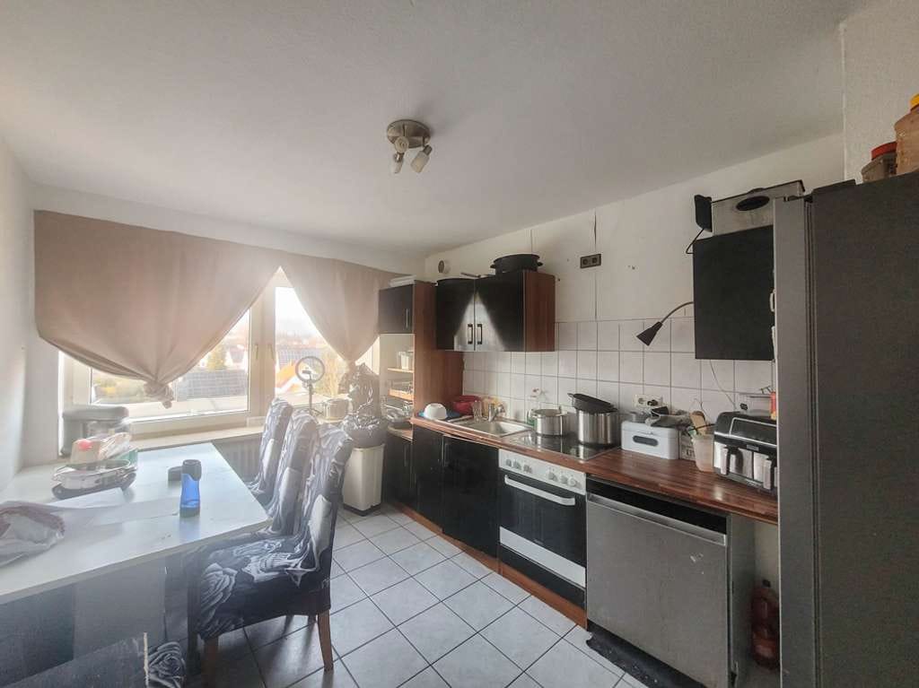 Immobilie in Springe - Vermietete 4-Zimmer-Wohnung mit Potenzial in gepflegten Mehrfamilienhaus - Bild 2