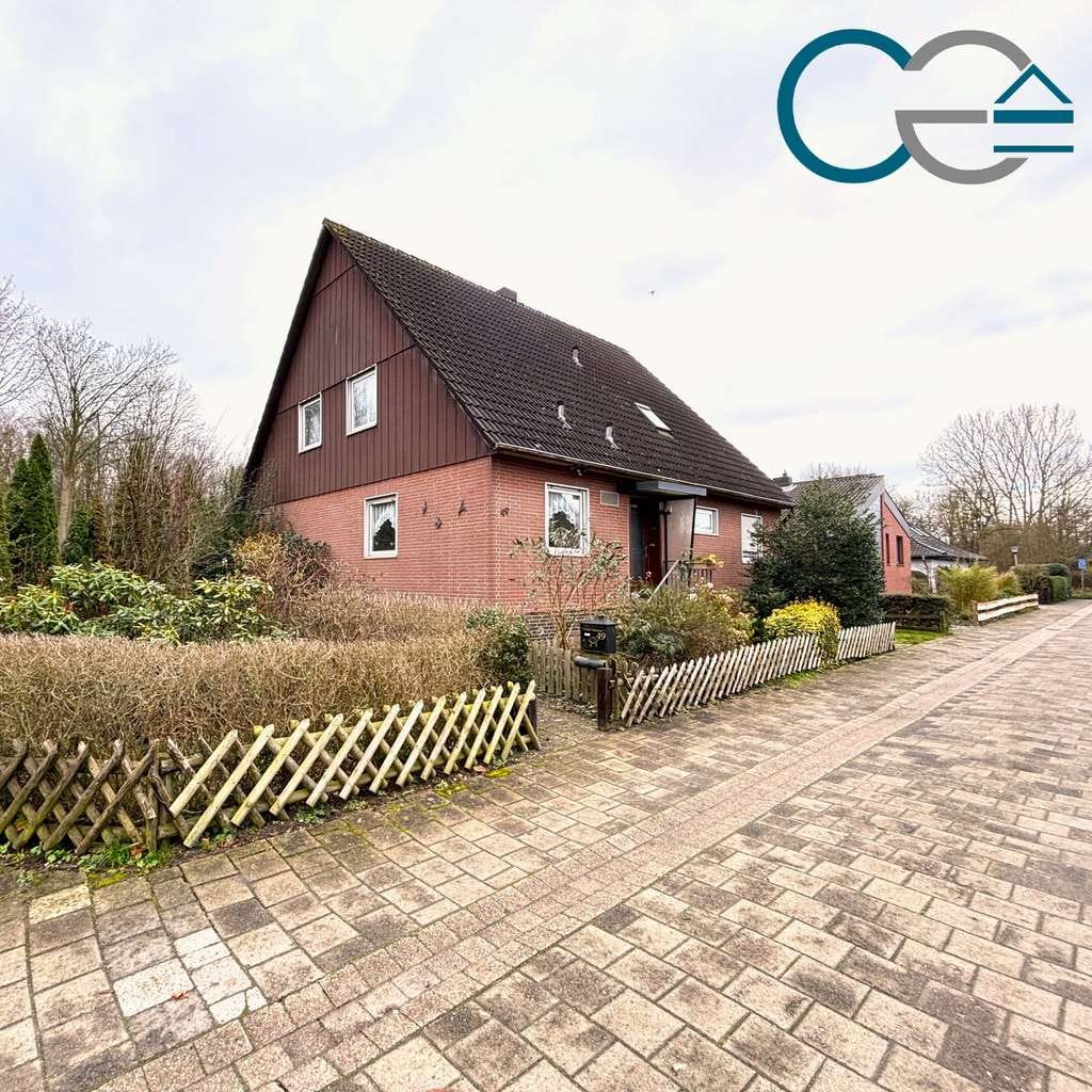 Immobilie in Nienburg/Weser - Gemütliches Einfamilienhaus in ansprechender Wohnlage mit großem Garten, Teich und Garage! - Bild 0