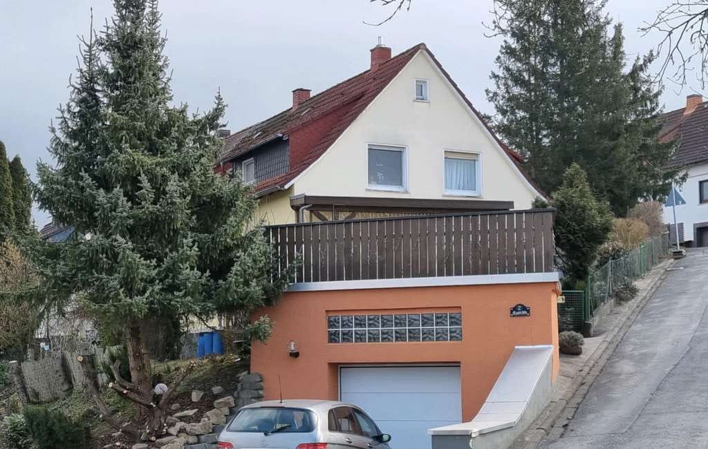 Immobilie in Hünfeld - DOPPELHAUSHÄLFTE MIT TOLLEM AUSBLICK AUFS GRÜNE - Bild 1