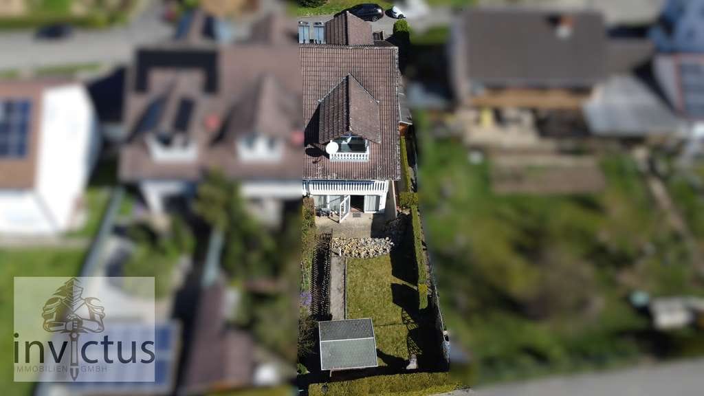 Immobilie in Gundelsheim - Viel Platz für Ihre Zukunft – charmantes Reihenendhaus mit Wintergarten & Kamin - Bild 2