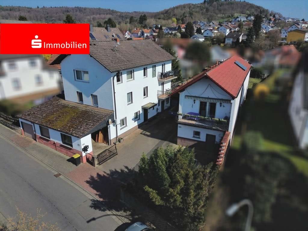Immobilie in Gründau - Attraktives Gesamtensemble: 2 Häuser, 3 Wohnungen – ideal für Eigennutzer oder Kapitalanleger - Bild 0