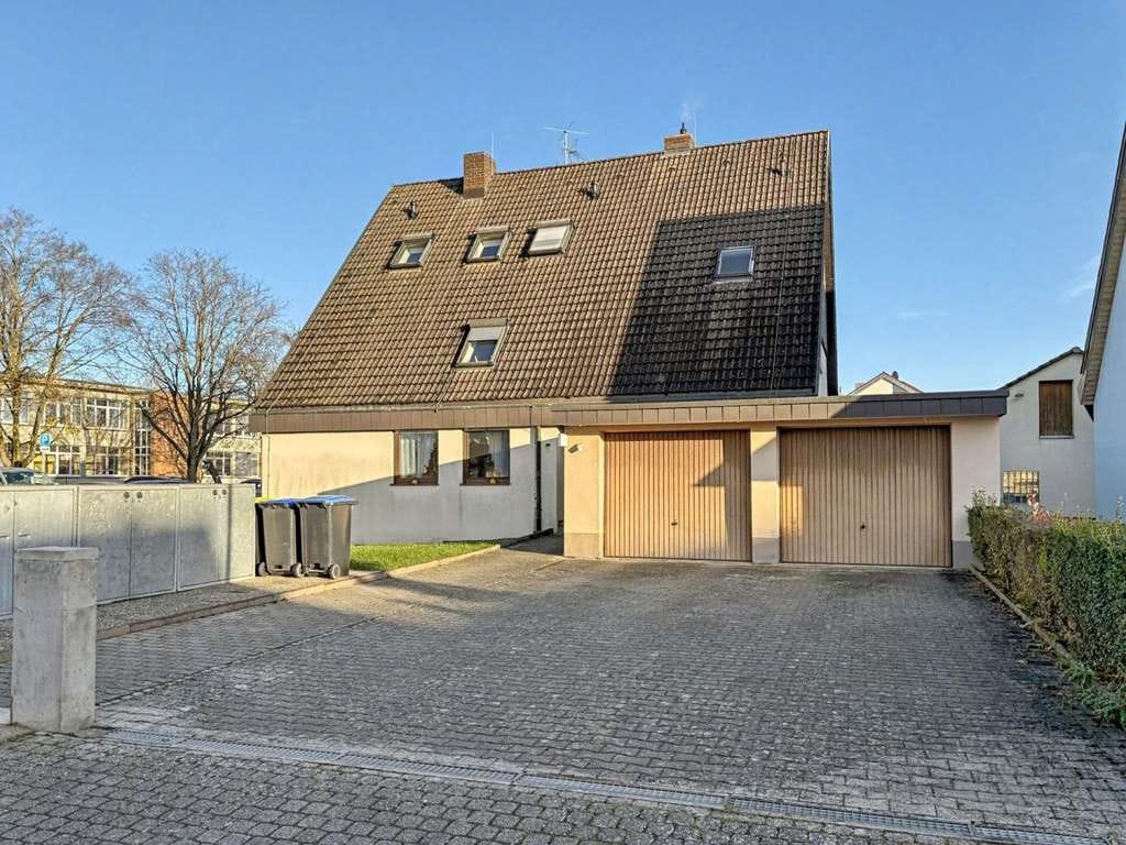 Immobilie in Breisach am Rhein - Voll vermietetes Vier-Parteien-Haus in guter Lage von Breisach-Gündlingen - Bild 2