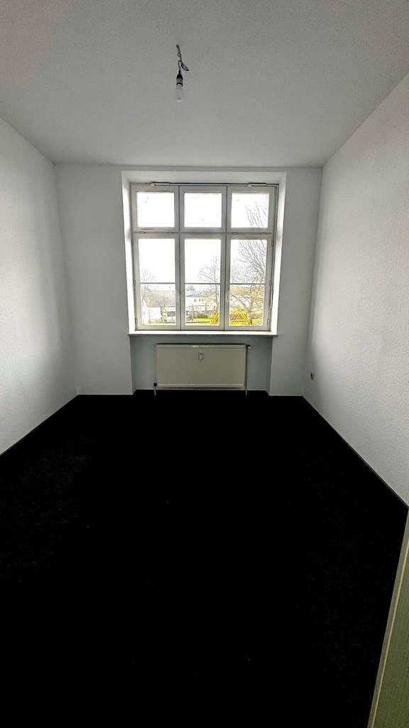 Immobilie in Sankt Wendel - Lichtdurchflutete kernsanierte ETW in historischem, denkmalgeschützten Schulgebäude in Bliesen - Bild 1
