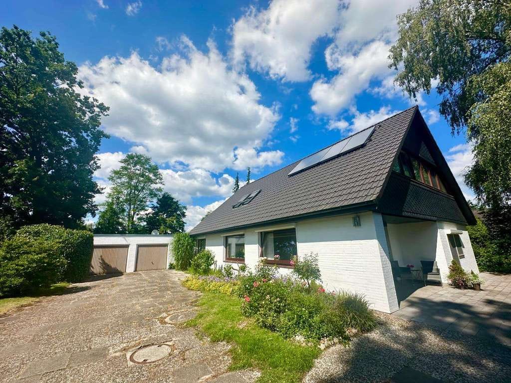 Immobilie in Ellerbek - Großzügiges und saniertes Einfamilienhaus mit viel Potenzial in Sackgassenendlage - Bild 1