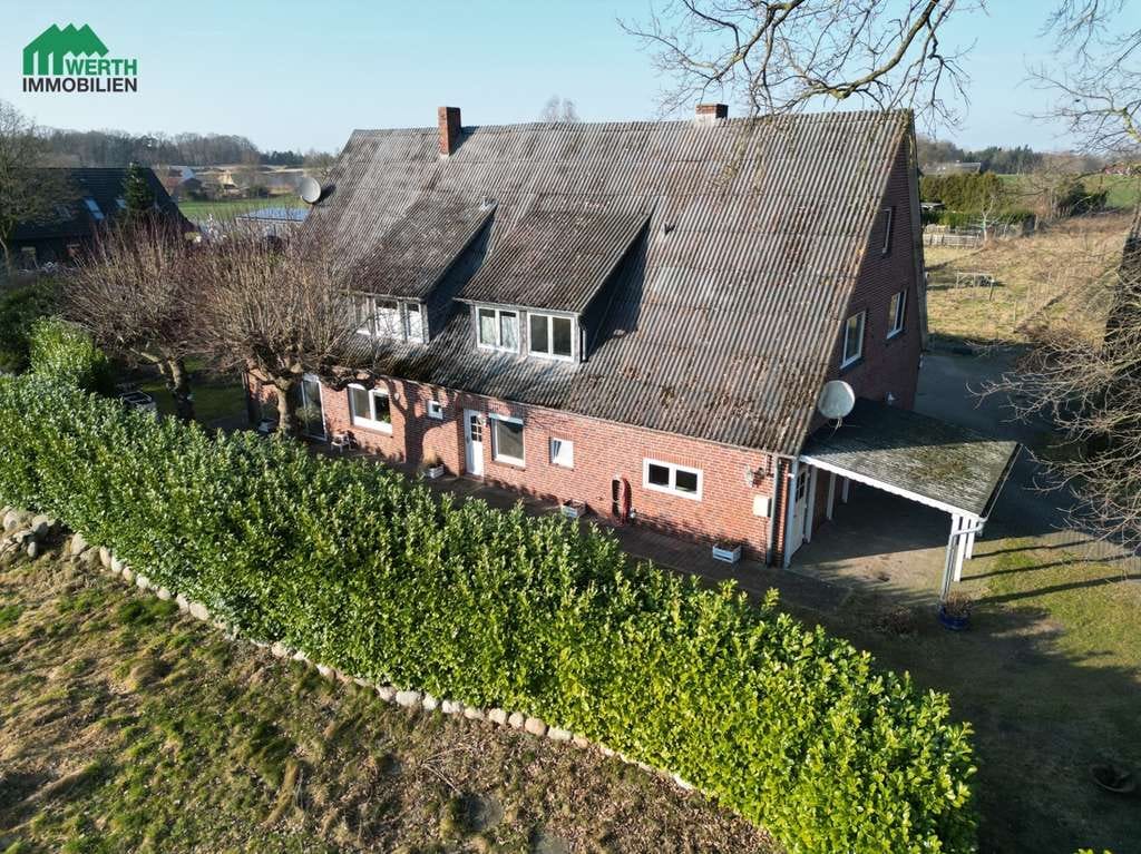 Immobilie in Burweg - Wohnen, vermieten oder zusammenleben – mit Gartenidylle und viel Platz im Grünen - Bild 2