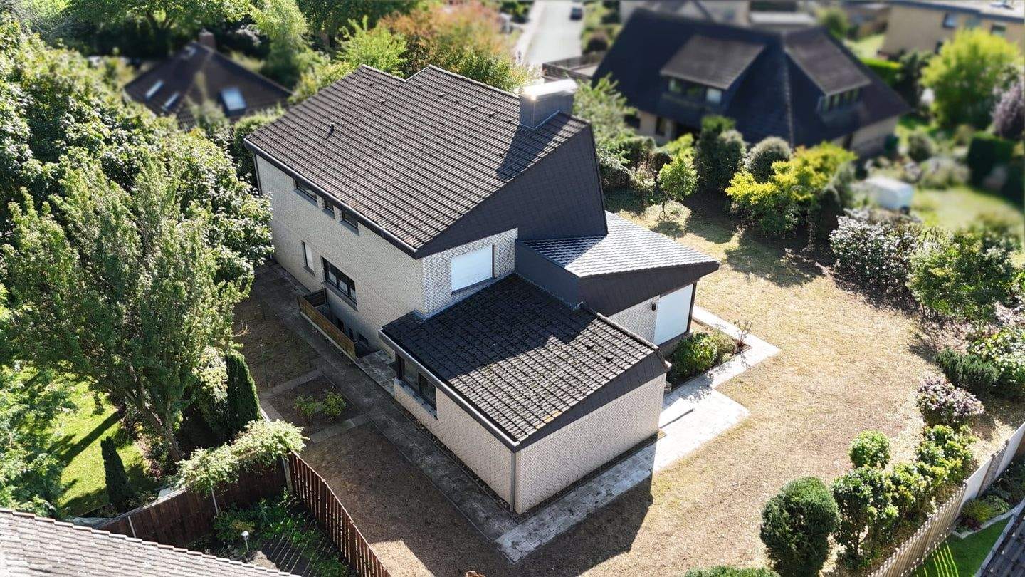 Immobilie in Wildeshausen - Schulviertel: EFH über 4 Ebenen auf knapp 206 m² Wohnfläche, ausgeb. DB mit Garage - Bild 3