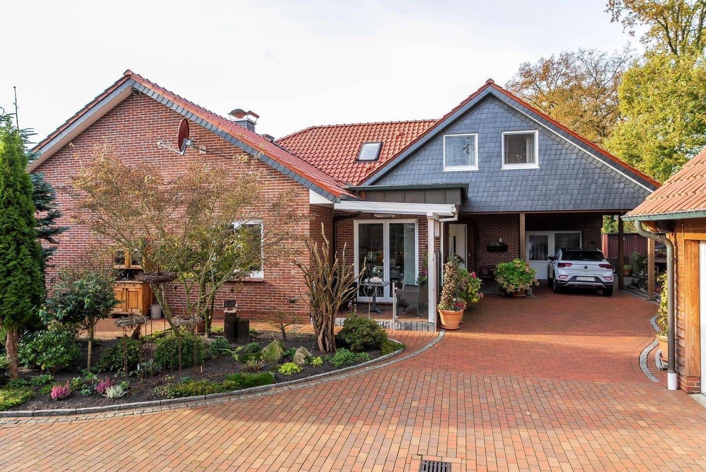 Immobilie in Edewecht - Modernes Mehrgenerationenhaus mit Einliegerwohnung - Bild 1