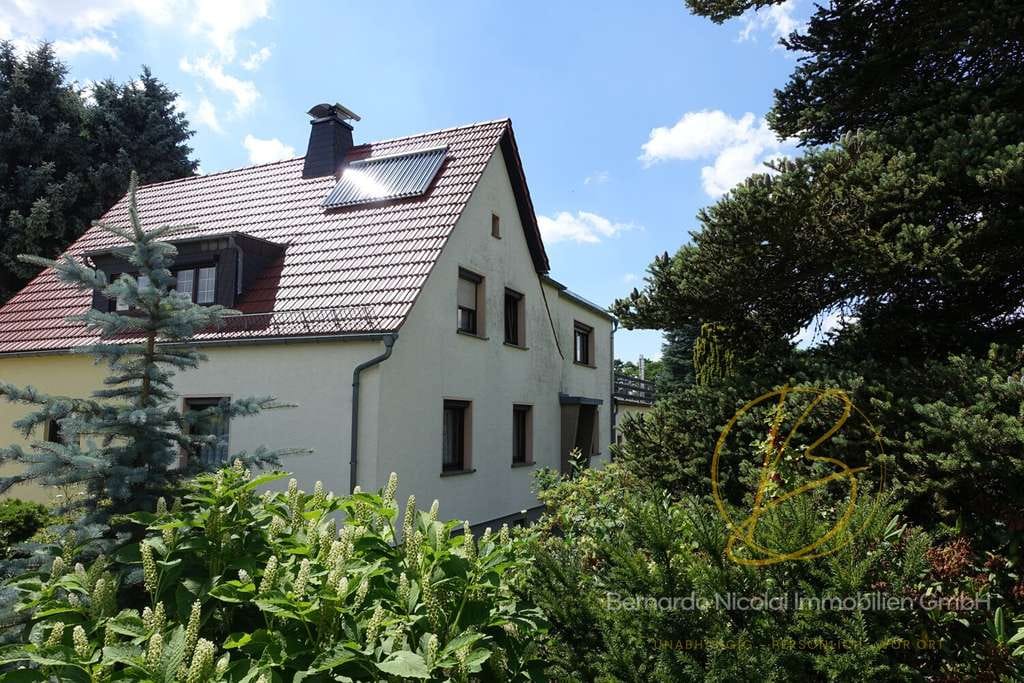 Immobilie in Pulsnitz - Viel Platz für Ihre Ideen – Doppelhaushälfte mit Garten und Nebengebäuden - Bild 1