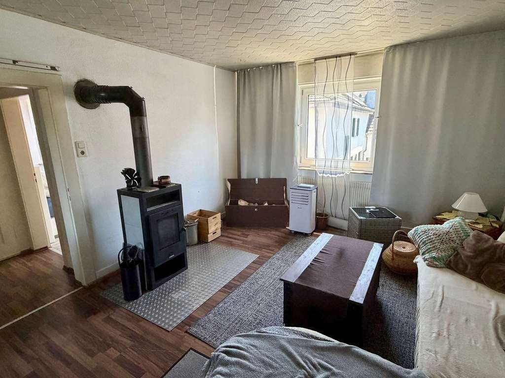 Immobilie in Roßdorf - Vielseitiges Zweifamilienhaus mit großem Garten und Entwicklungspotenzial in begehrter Wohnlage - Bild 4