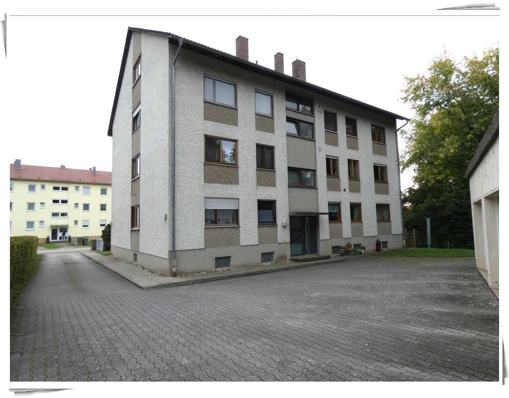 Immobilie in Schillingsfürst - 4-Zimmer-Eigentumswohnung mit schönem Balkon, Einbauküche und Garage - Bild 1