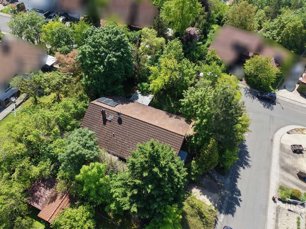 Immobilie in Grünsfeld - Charmantes Einfamilienhaus mit separater Einliegerwohnung in gefragter Lage von Grünsfeld
 - Bild 3