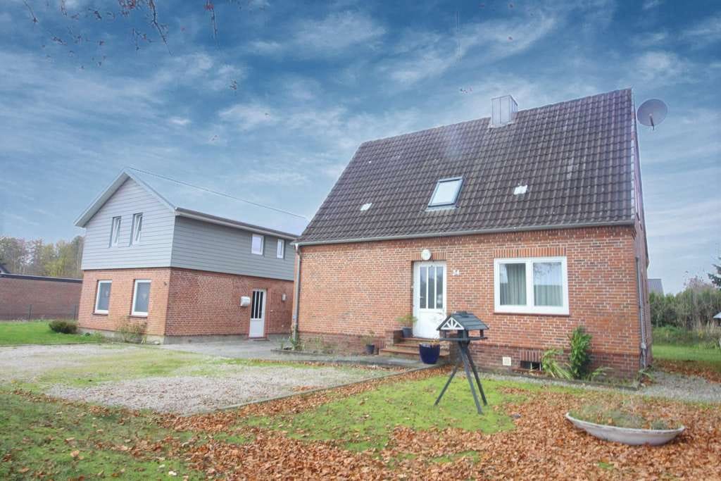 Immobilie in Schafflund - Zwei Einfamilienhäuser mit Carport inkl. Abstellraum  - Bild 1