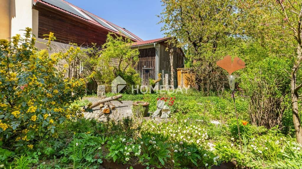 Immobilie in Kammerstein - Einfamilienhaus mit 2 Wohneinheiten und weiterem Ausbaupotenzial mit Naturgarten und Nebengelass - Bild 2