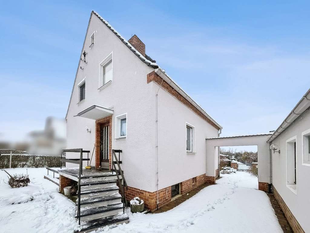 Immobilie in Lohmen - Charmantes und gepflegtes Einfamilienhaus mit Garage in Lohmen unweit von Dresden - Bild 1