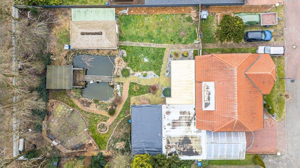 Immobilie in Niederlangen - Vermietetes Einfamilienhaus mit Garage, Carport, überdachter Terrasse und großem Gartenhaus! - Bild 3