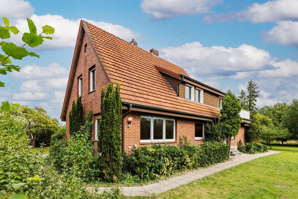 Immobilie in Lengerich - Vielseitiges Zweifamilienhaus mit großem Grundstück im grünen Außenbereich von Lengerich - Bild 2