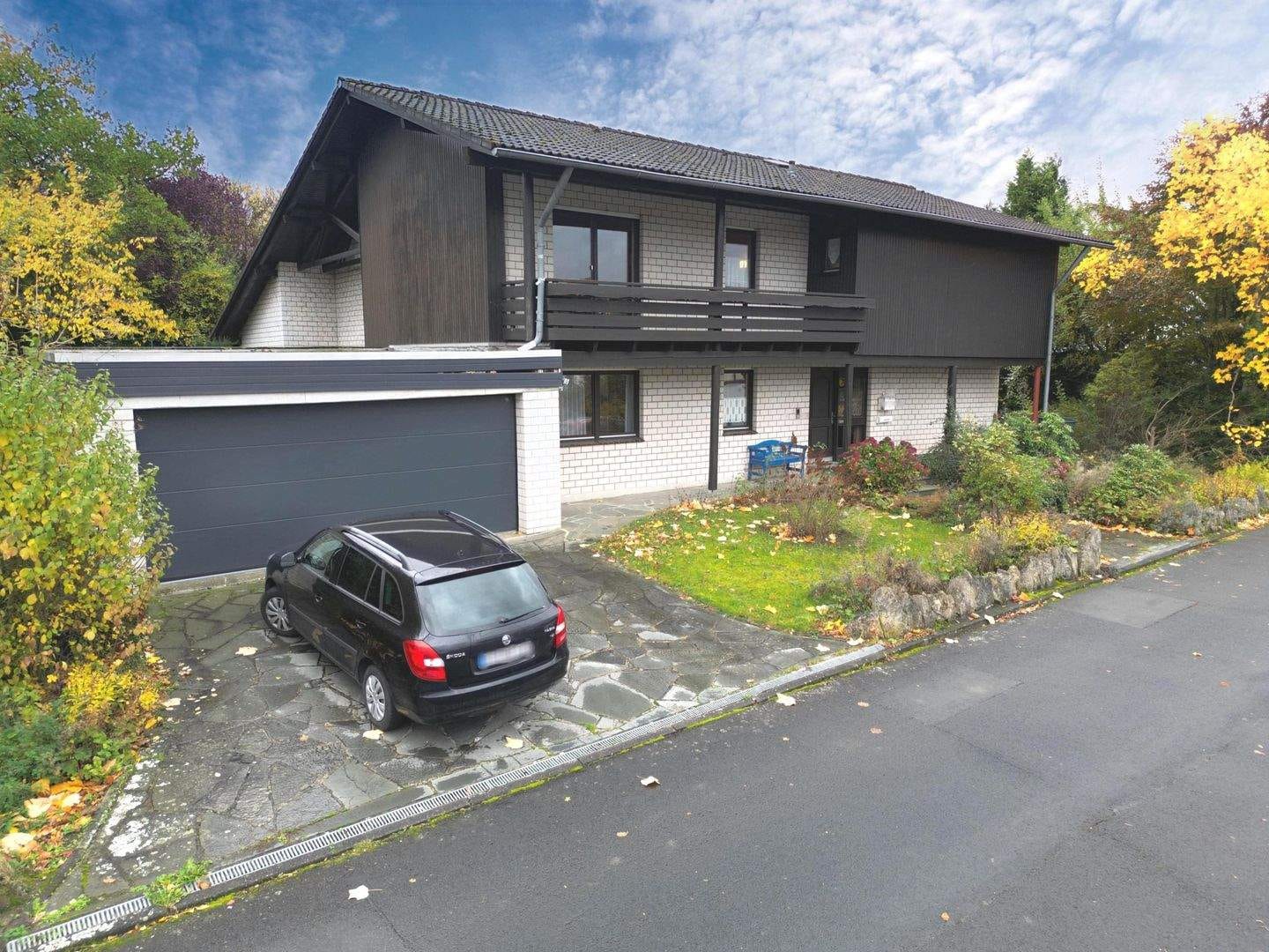 Immobilie in Ahnatal - Lichtdurchflutetes Einfamilienhaus in idyllischer Ortsrandlage von Ahnatal-Weimar - Bild 0