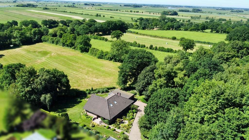 Immobilie in Ramstedt - Wohnen, wo die Ruhe zuhause ist – Einfamilienhaus mit Traumgrundstück und unverbaubarem Feldblick - Bild 1