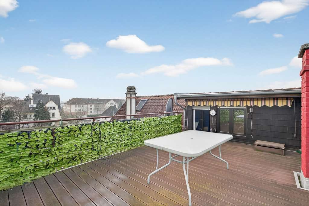 Immobilie in Rastatt - Stilvolle Maisonettewohnung mit Kamin und sonniger Dachterrasse - Bild 1