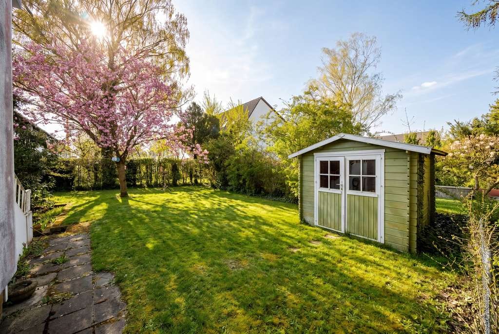 Immobilie in Hohenbrunn - Bezugsfreies Reiheneckhaus mit großem Garten in Top-Lage Ottobrunns - Bild 1