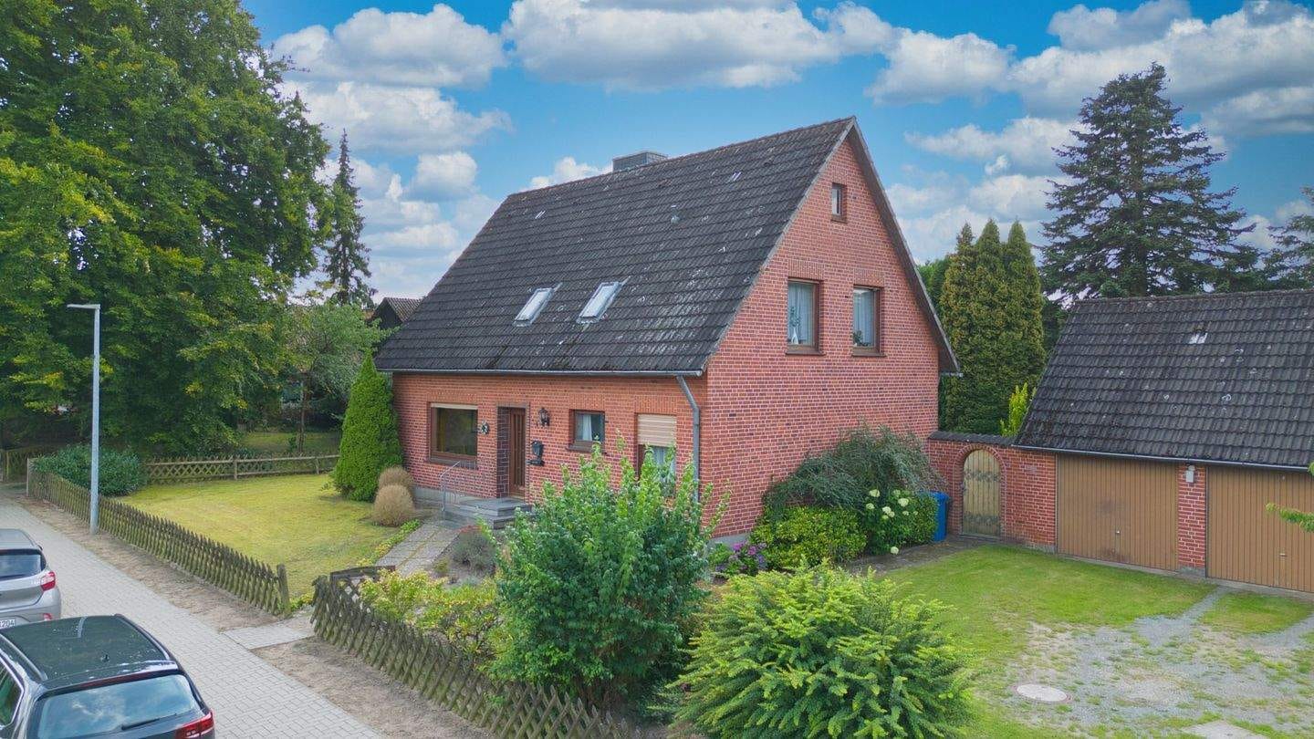 Immobilie in Brackel - Haus mit weiterem Baugrundstück in Brackel - Bild 1